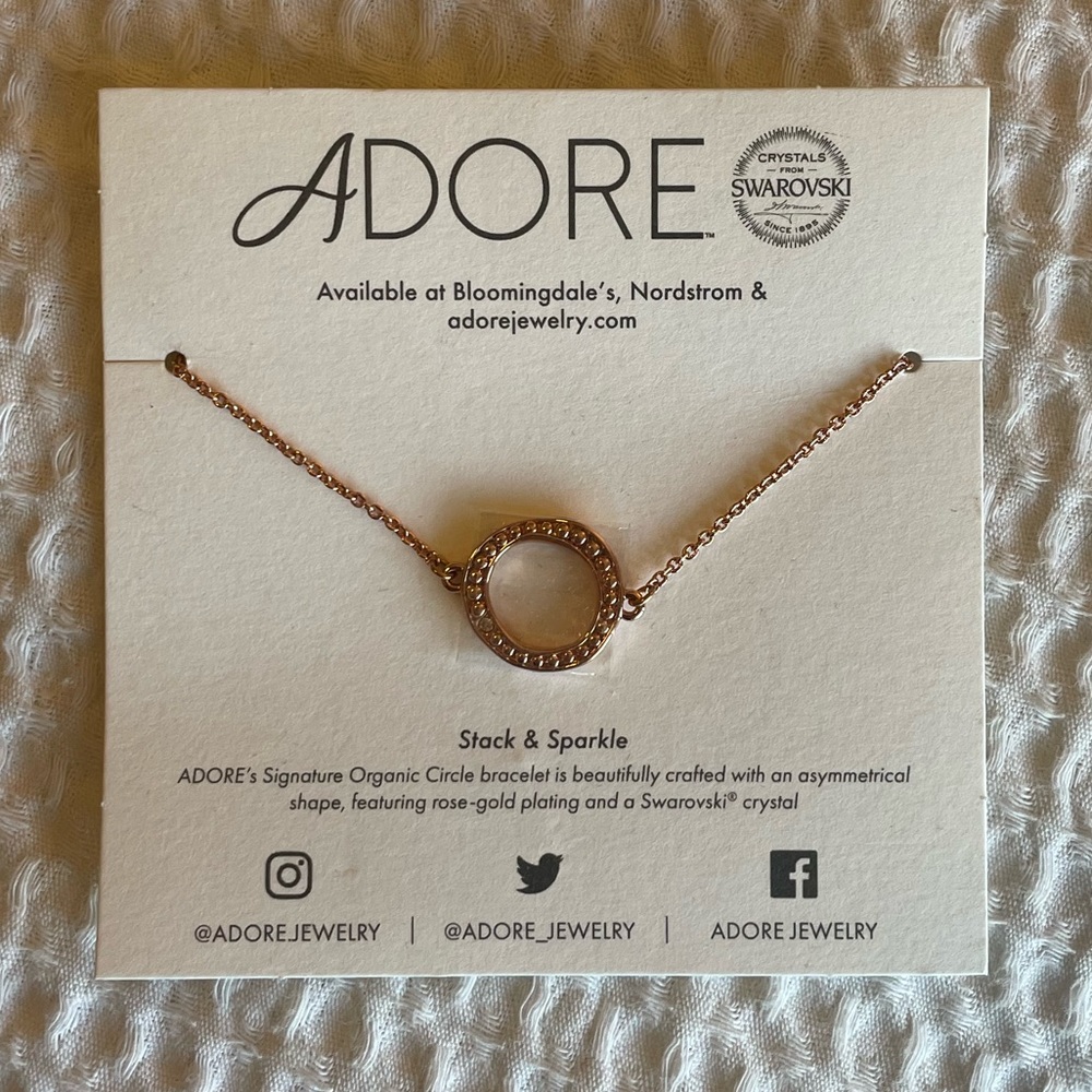 ADORE’s Signature Circle bracelet in rose gold with a Swarovski crystal! NWT